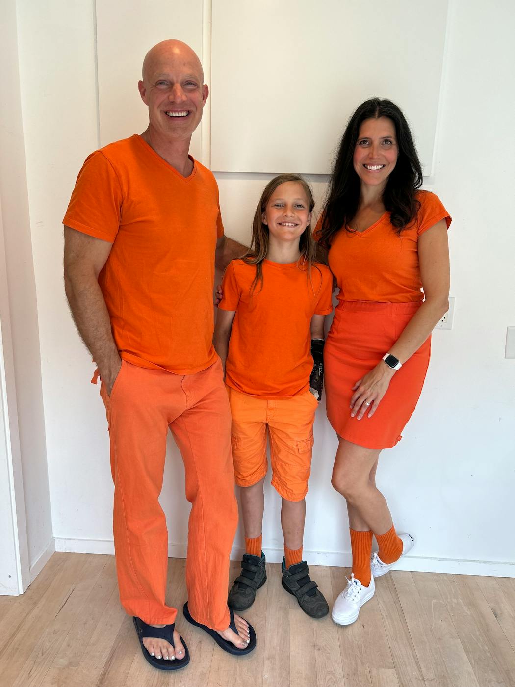 Darren, Harold and Claire DeBerg have been known to match in bold colors, in part to promote the family’s Monochrome clothing line. A recent visit to their home apparently was on Orange Day.