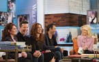 In this Monday, Sept. 25, 2017 photo, the cast of Will & Grace, from left, Megan Mullally, Sean Hayes, Debra Messing and Eric McCormack talk with Megy