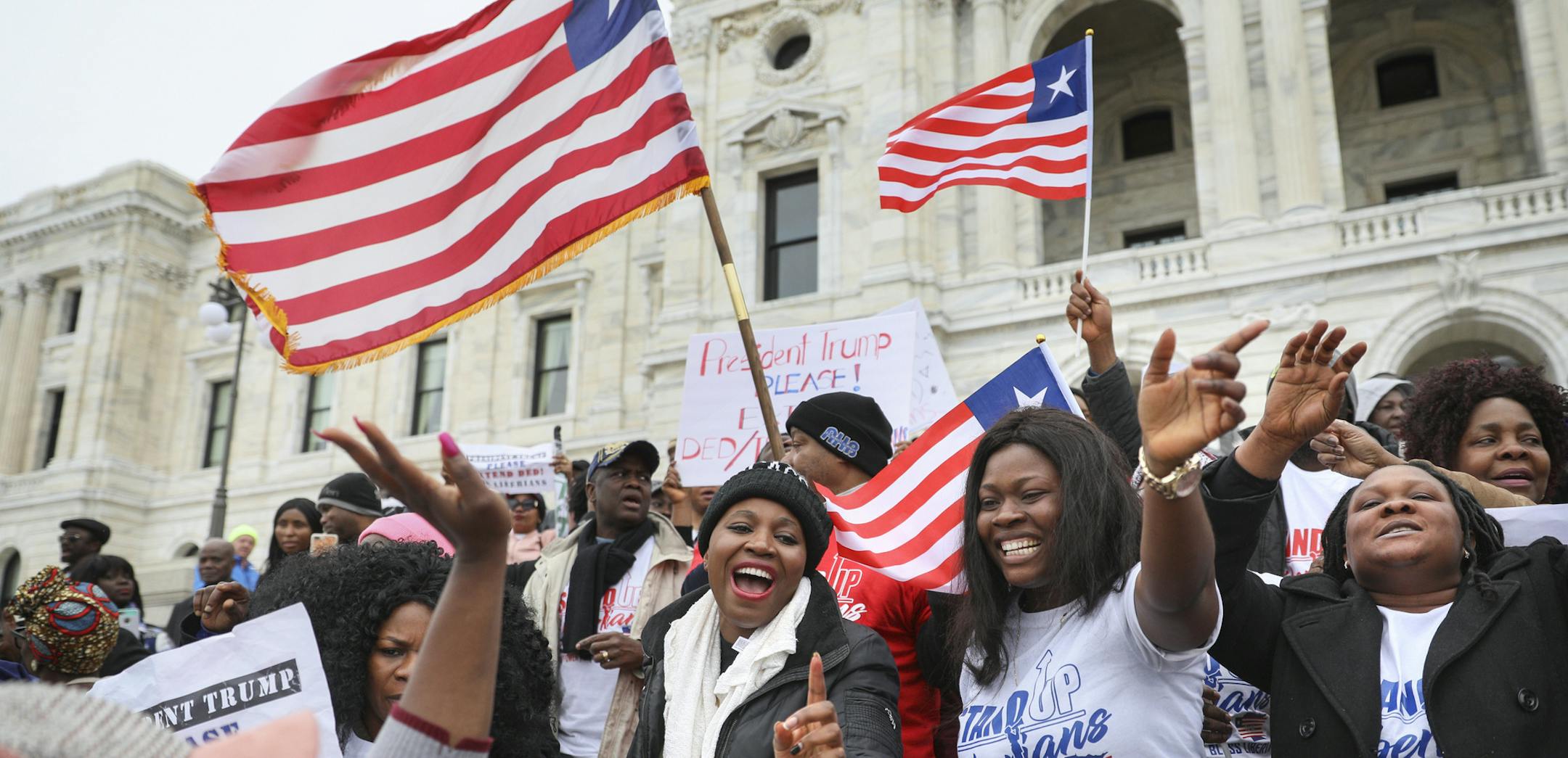 Hundreds of Twin Cities Liberians, including Evely Jarbatt (Center), gathered on the steps of the state Capitol for a rally in support of extending a federal deportation reprieve program for Liberian natives called Deferred Enforced Departure, or DED. The program is slated to expire at the end of this month. Eight of 10 members of Minnesota's congressional delegation wrote to President Trump urging him to extend it. BRIAN PETERSON ï brian.peterson@startribune.com
St. Paul, MN 03/26/18