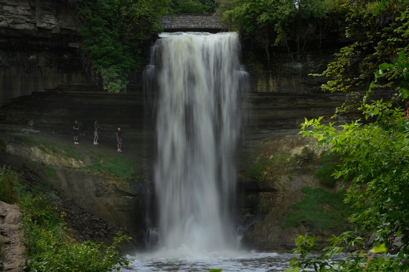 Thrill seekers hiked behind Minnehaha Falls Tuesday afternoon. ] AARON LAVINSKY • aaron.lavinsky@startribune.com