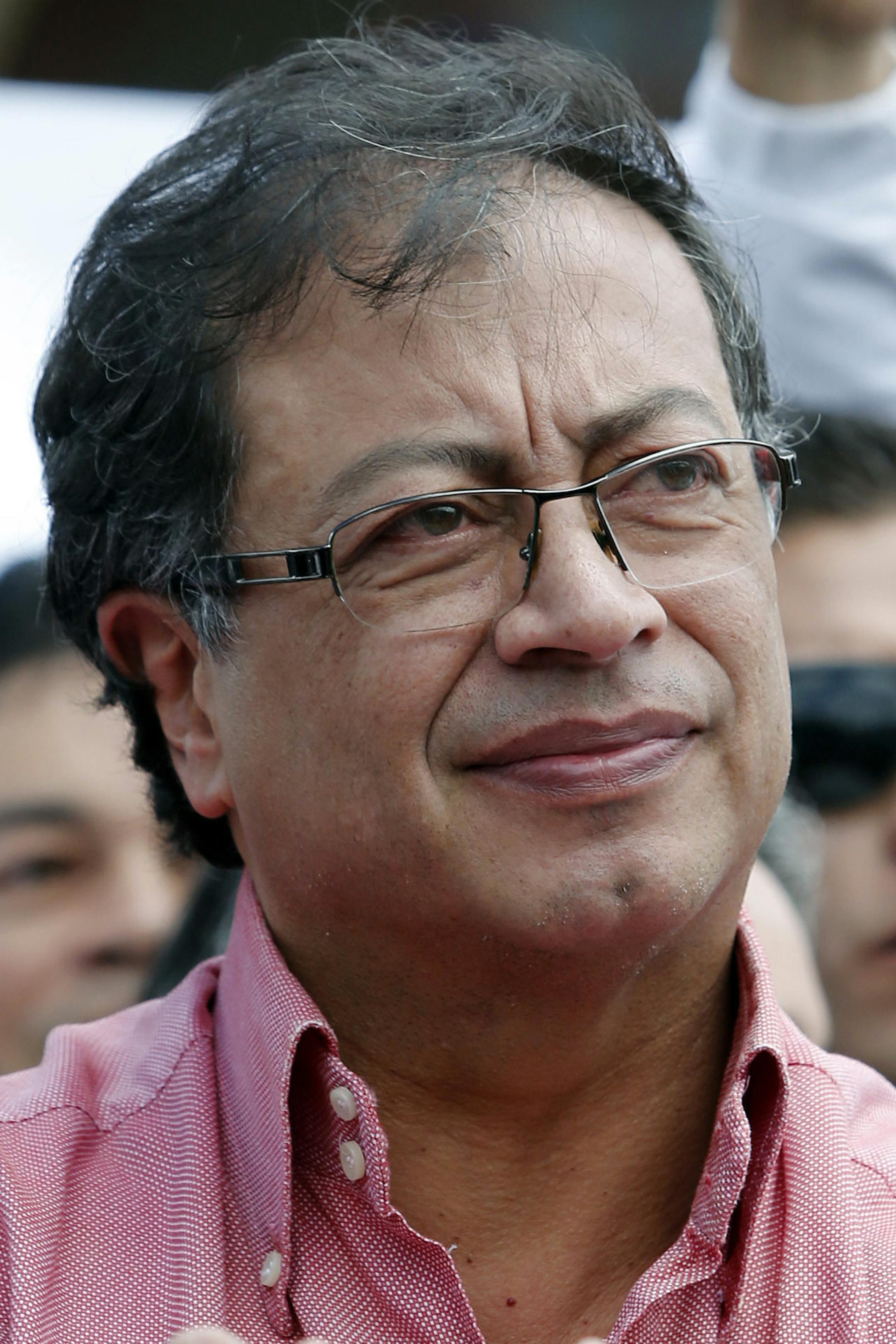 Gustavo Petro, presidential candidate for Colombia Humana, attends a campaign rally in Bogota, Colombia, Friday, June 8, 2018. Petro will face Ivan Duque, presidential candidate for the Democratic Center, in a run-off election on June 17. (AP Photo/Fernando Vergara)