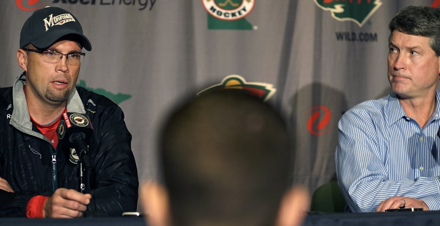 Wild coach coach Mike Yeo, left, and General Manager Chuck Fletcher