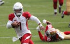 Cardinals quarterback Kyler Murray made for an elusive target, running past 49ers cornerback Richard Sherman to score a touchdown during the second ha