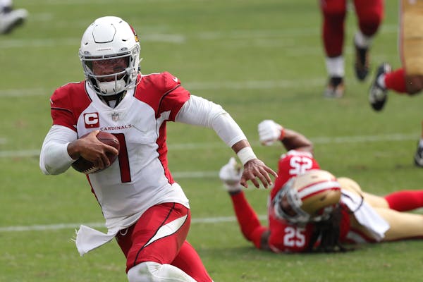 Cardinals quarterback Kyler Murray made for an elusive target, running past 49ers cornerback Richard Sherman to score a touchdown during the second ha