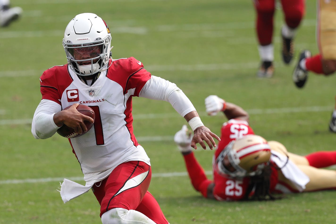 Cardinals quarterback Kyler Murray made for an elusive target, running past 49ers cornerback Richard Sherman to score a touchdown during the second half Sunday.