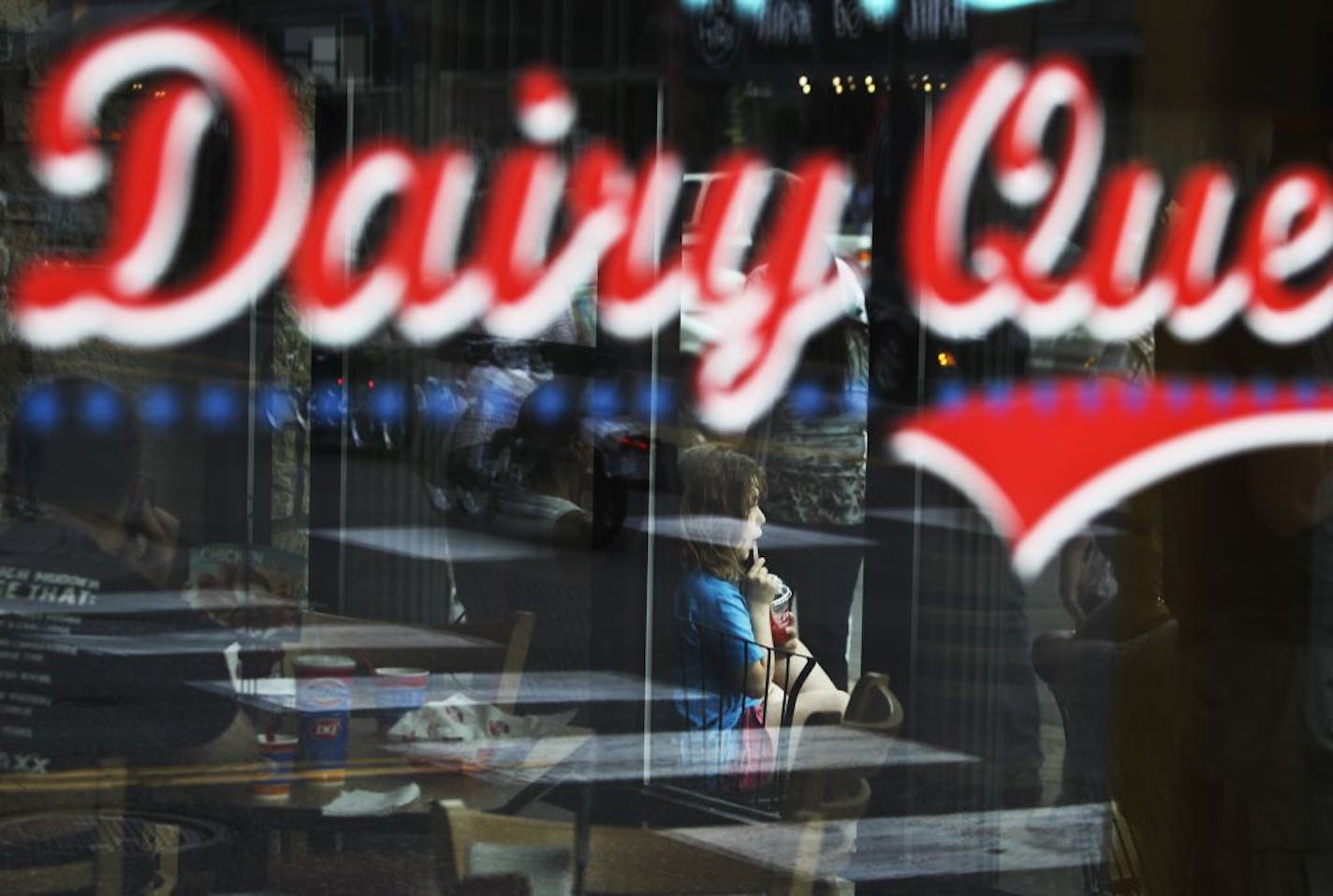 A young girl enjoyed a cold treat at Dairy Queen Saturday, May 19, 2012, in Stillwater, MN.