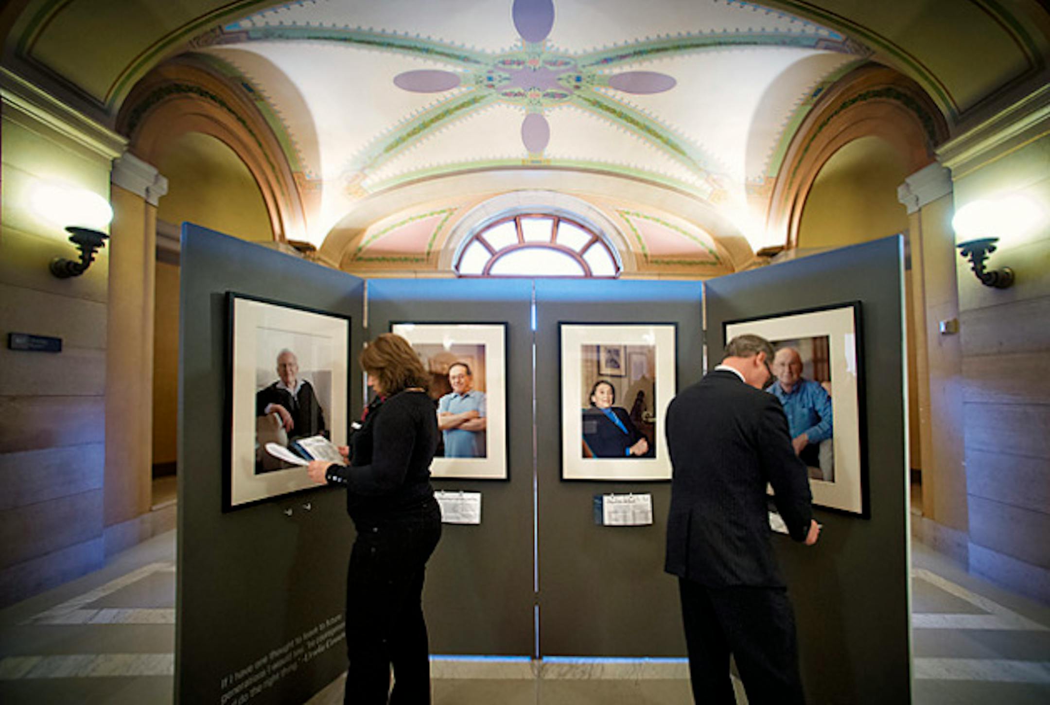 As part of Minnesota's Observance of International Holocaust Remembrance Day visitors viewed "Transfer of Memory," a photography exhibit honoring local Holocaust Survivors in the Minnesota State Capitol Rotunda. The exhibit was photographed by local artist, David Sherman, and will be on display in the North Corridor of the Minnesota State Capitol from January 8 – 18. Tuesday, January 15, 2013.    ]   GLEN STUBBE * gstubbe@startribune.com
