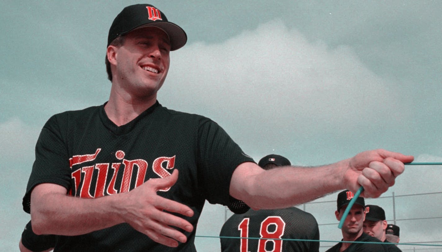 Minnesota Twins replacement pitcher Barry Wohler manages a smile in first day of spring training Friday, Feb. 17, 1995, in Fort Myers, Fla, as he attempts to make a comeback in baseball. The 32-year-old Wohler, a Minnesota prep standout from Bird Island, Minn., in three sports, gave up baseball after a short stint with the Dodgers farm system in 1988.(AP Photo/Jim Mone)