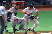 The classic image from the 1991 World Series is from Game 2, when Atlanta's Ron Gant had just singled to left field. But he was tagged coming back to 