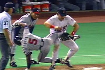 The classic image from the 1991 World Series is from Game 2, when Atlanta's Ron Gant had just singled to left field. But he was tagged coming back to 