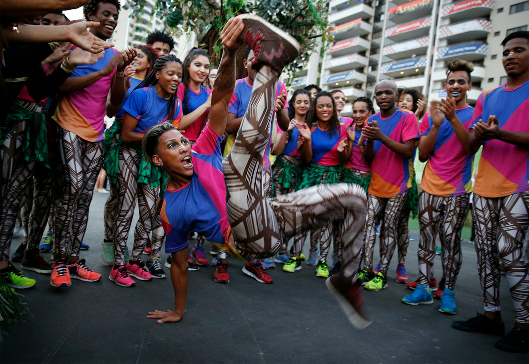 The American flag was raised in the Olympic Athlete Village Thursday afternoon during a welcome ceremony. Athletes were greeted by Brazilian dancers who entertained the crowd.