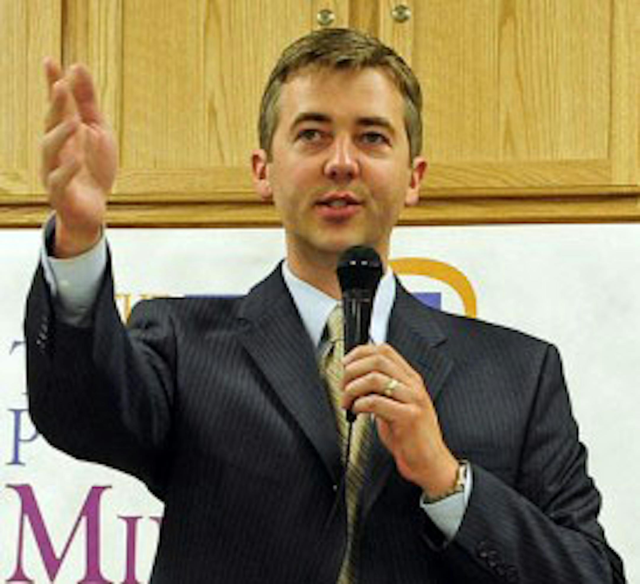 Duluth Mayor Don Ness signaled to an audience member to ask a question during a press conference for the new Miracle Field in Lincoln Park. Howie Hanson / For StarTribune.com