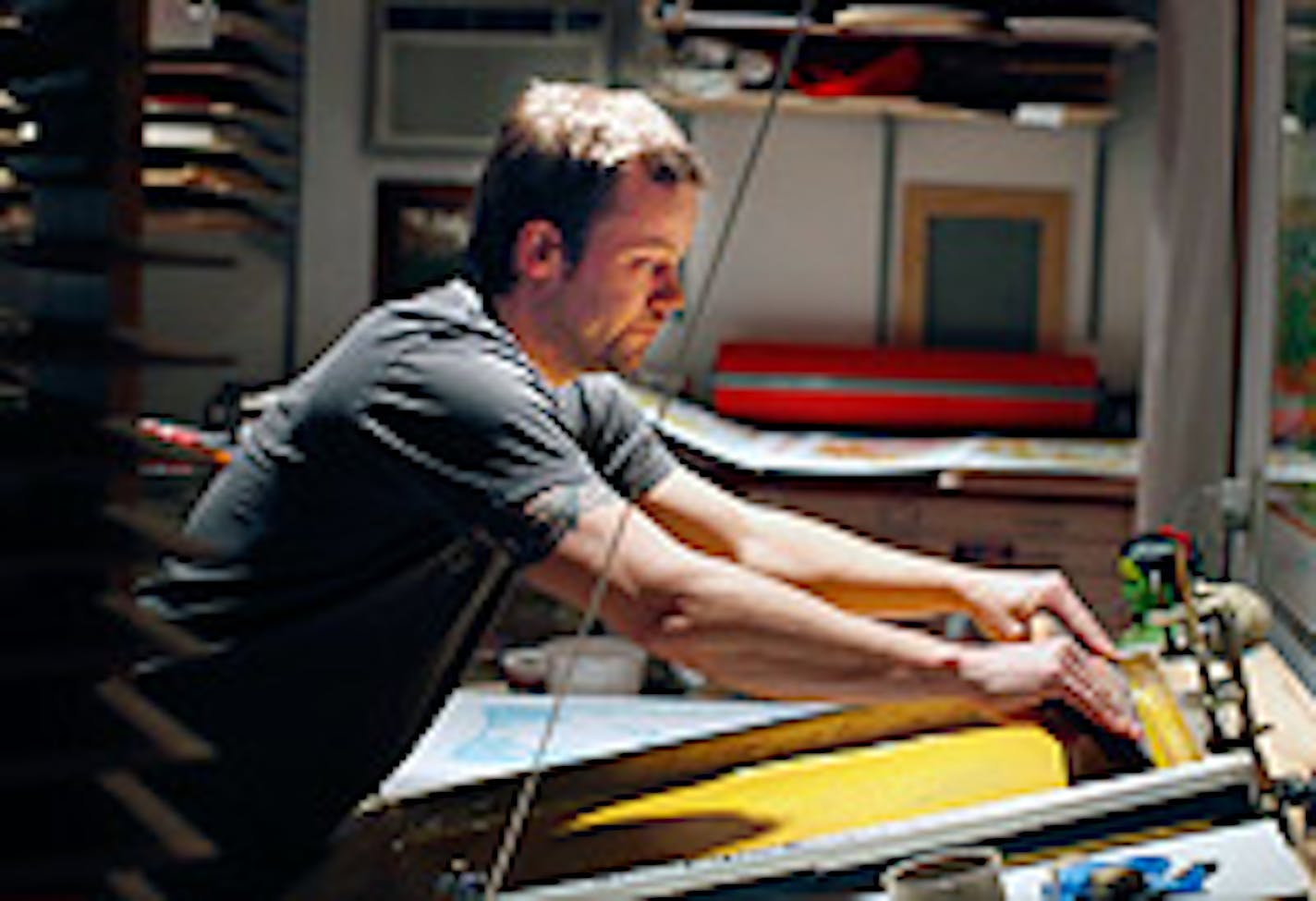 Adam Turman works in his studio in St. Louis Park.