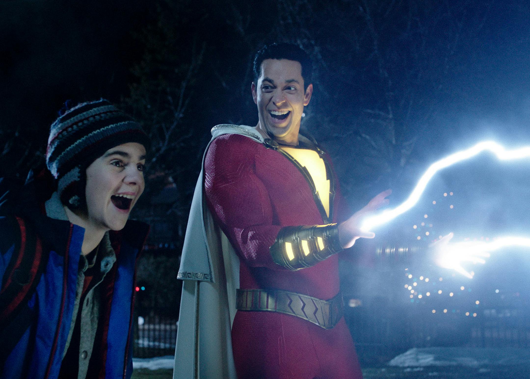 Freddy Freeman (Jack Dylan Grazer) watches Shazam (Zachary Levi) do his "Lightning from my hands" routine, which will have you humming "Eye of the Tiger" the rest of the day. (Warner Bros. Pictures/TNS) ORG XMIT: 1298594