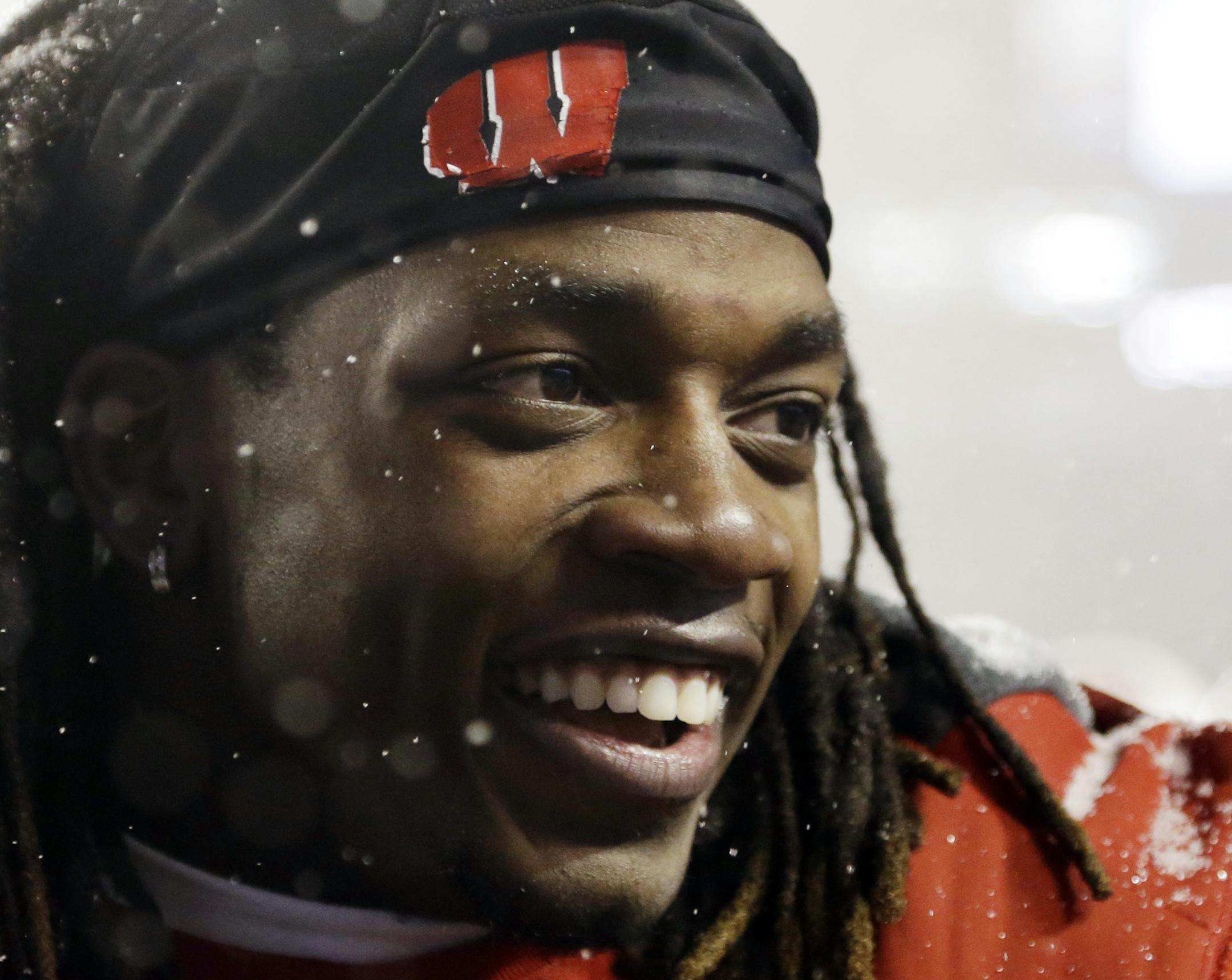 Wisconsin's Melvin Gordon celebrates after their 59-24 win over Nebraska in an NCAA college football game Saturday, Nov. 15, 2014, in Madison, Wis. Gordon rushed for a major college-record 408 yards and four touchdowns in the game. (AP Photo/Morry Gash) ORG XMIT: WIMG123