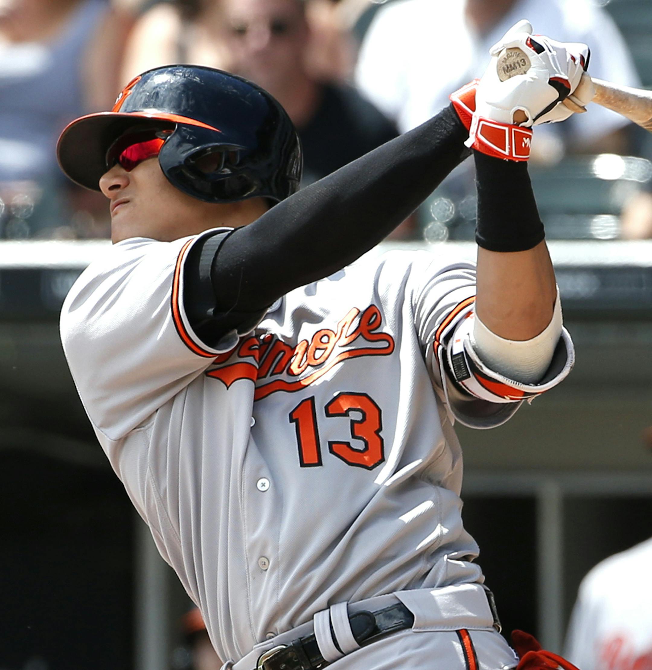 Baltimore Orioles' Manny Machado hits a two-run home run against the Chicago White Sox during the first inning of a baseball game in Chicago, Sunday, Aug. 7, 2016. (AP Photo/Nam Y. Huh)