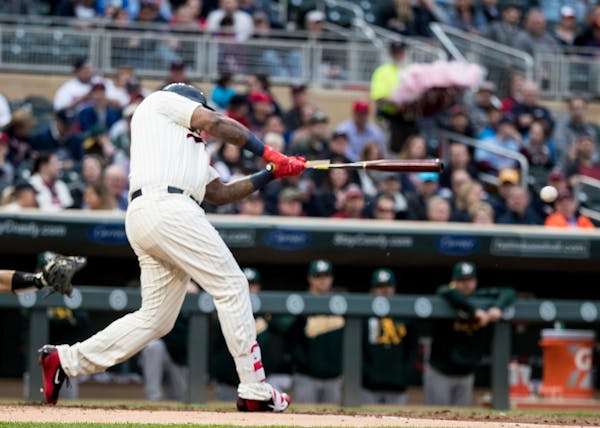 Twins first baseman Kennys Vargas (19) hit a single to center that scored Brian Dozier and Miguel Sano.