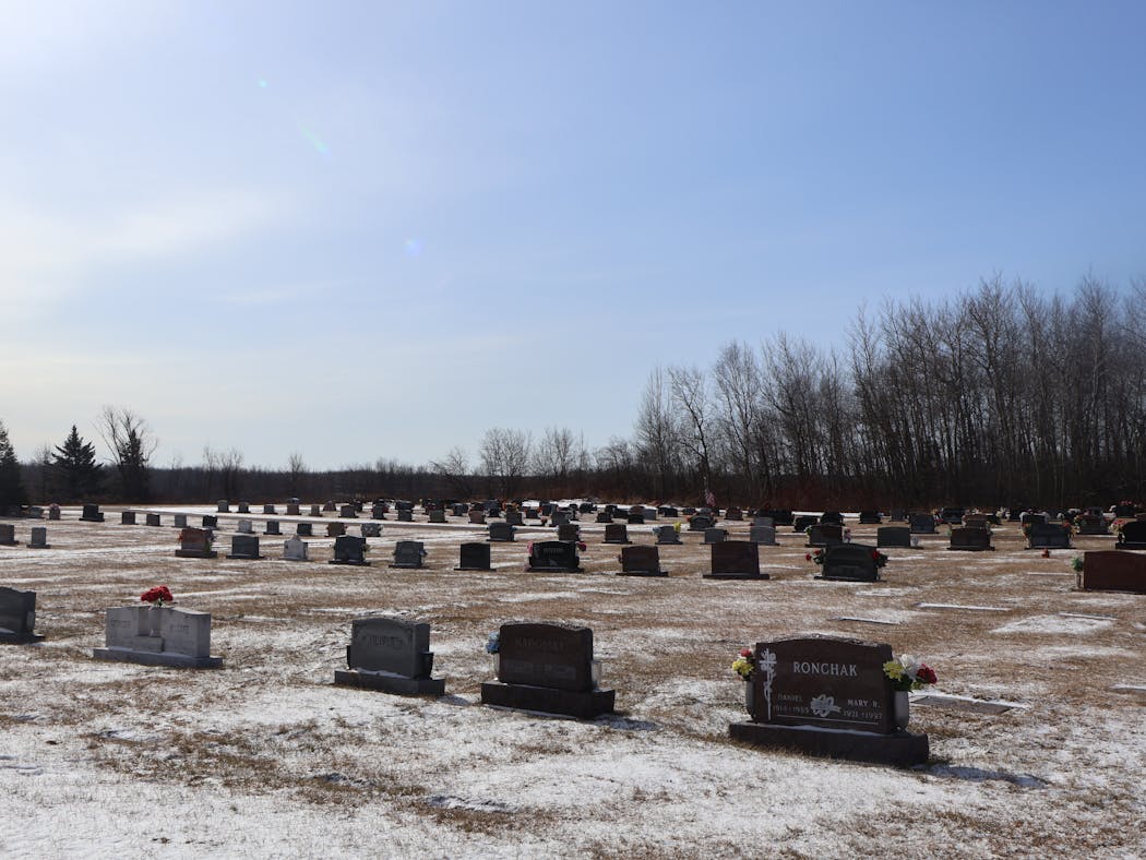 The St. Francis Cemetery in Superior borders a proposed gas-fired power plant. The tree line in the background is part of the border.
