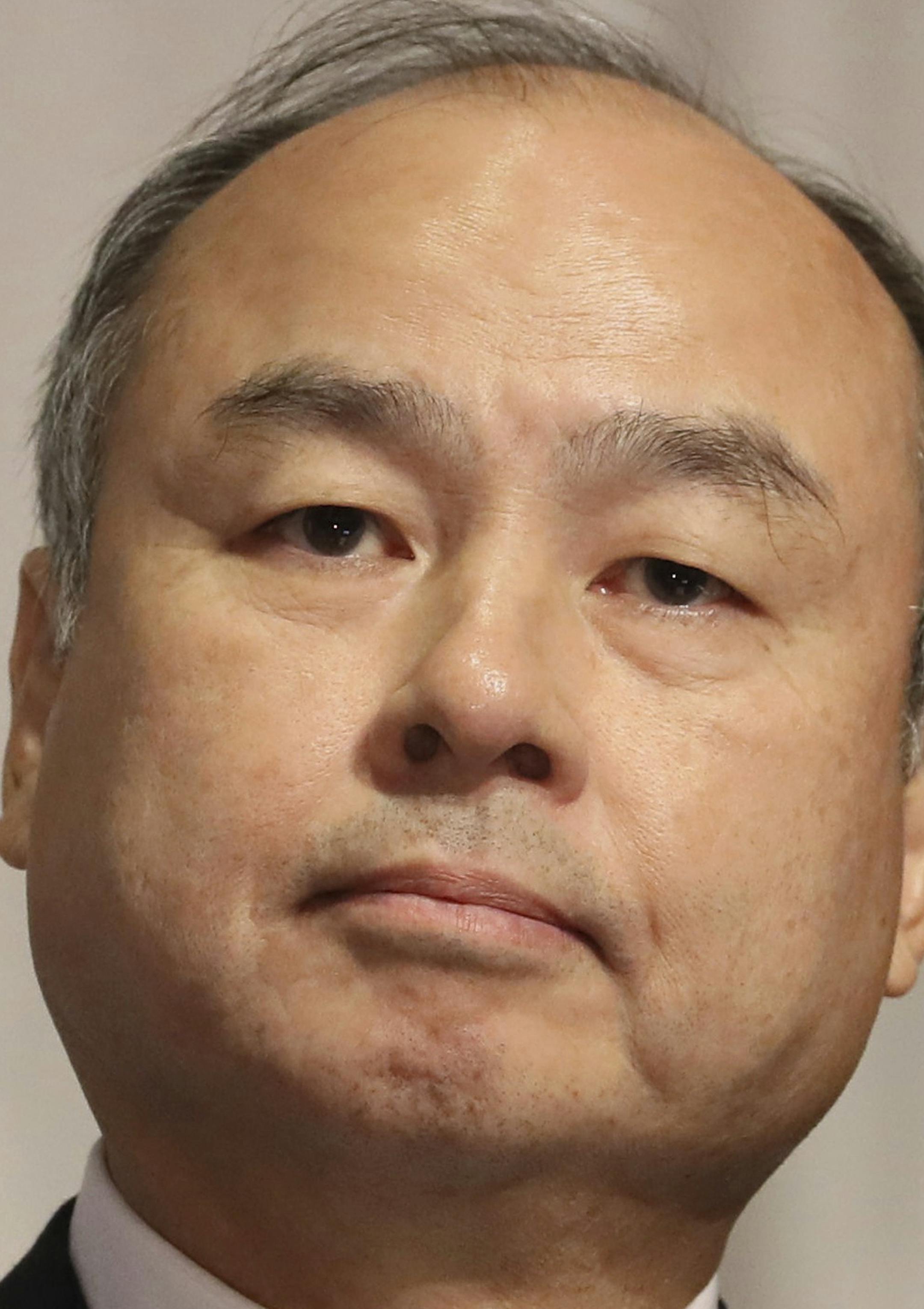 Masayoshi Son, CEO and president of SoftBank Group Corp. announces its first quarterly operating loss in 14 years in Chuo Ward, Tokyo on Nov. 6, 2019. The Japanese mobile giant company recorded $6.5 billion loss triggered by investing WeWork and Uber Technologies Inc. companies. ( The Yomiuri Shimbun via AP Images ) ORG XMIT: YOMIU