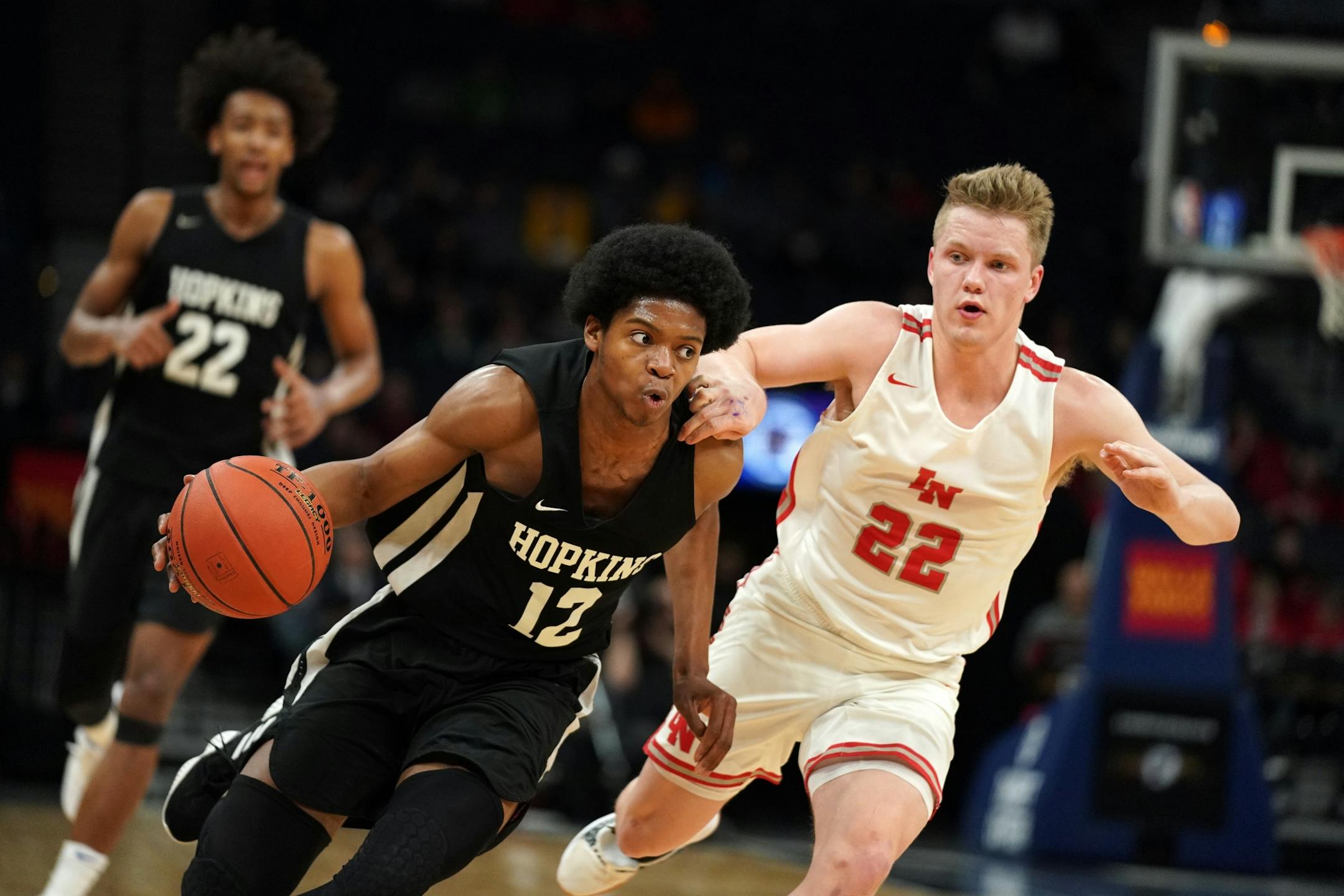 Hopkins guard Kerwin Walton (12) drove to the basketball during the 4A state basketball tournament in March.