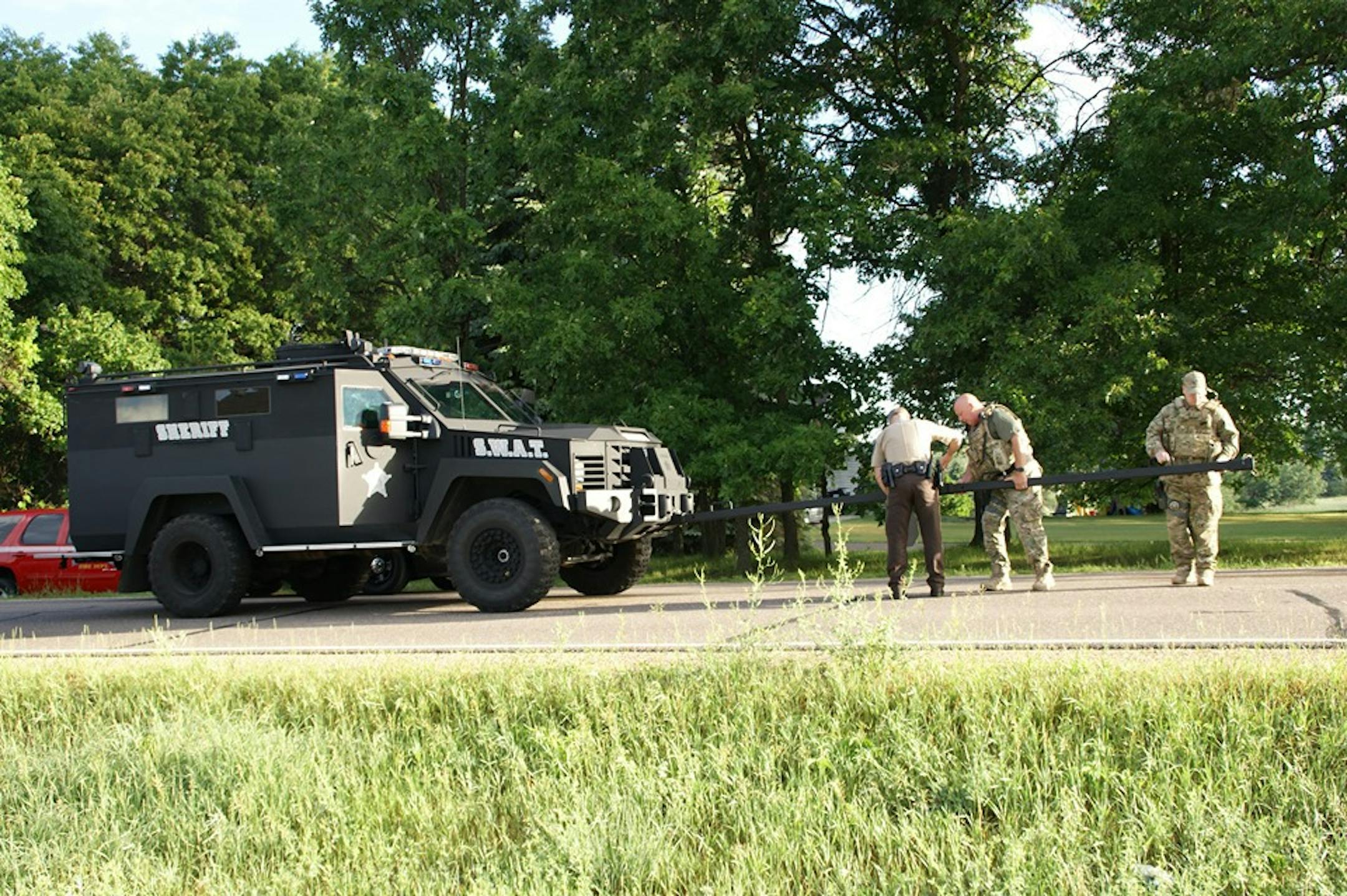 A large house fire in Andover brought firefighters and an Anoka County Sheriff's Office SWAT team to the scene early Wednesday, June 24. Provided by Twin Cities Fire Wire