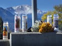 Pikes Peak forms a backdrop Monday, Nov. 2, 2015, for a memorial to the victims of Saturday's shootings in downtown Colorado Springs, Colo. The man wh