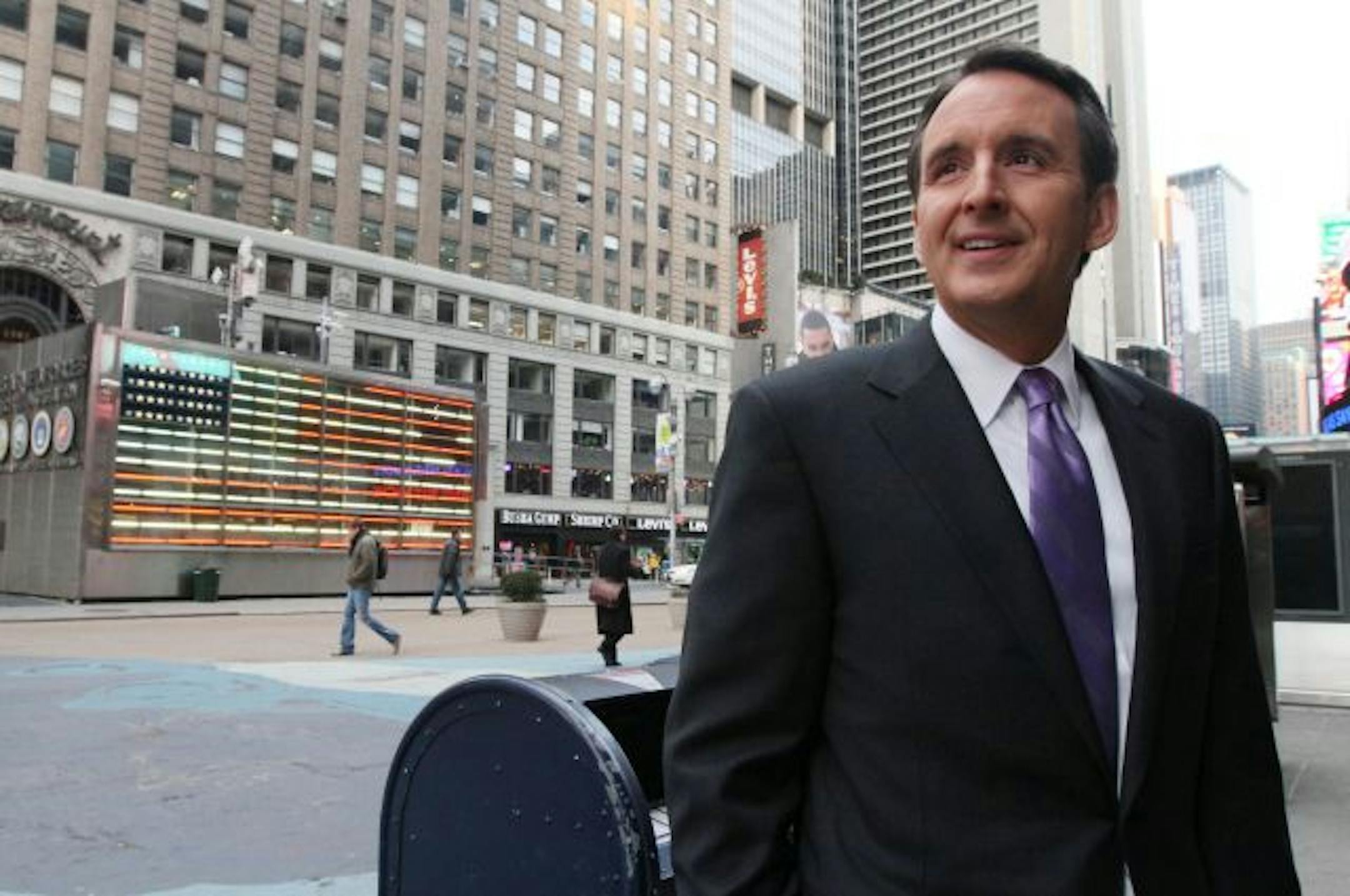 Tim Pawlenty paused in Times Square on Tuesday morning after hawking his book on the "Good Morning America" show and then proceeded with a day jammed with media appearances.