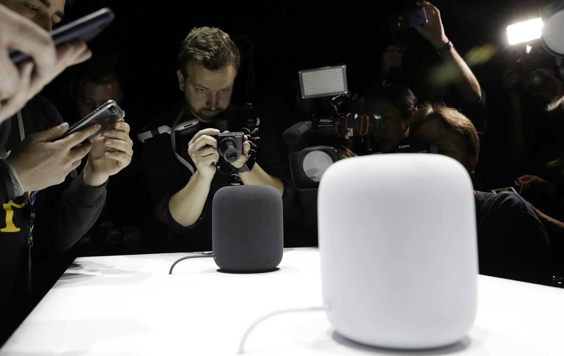 FILE - In this Monday, June 5, 2017, file photo, the HomePod speaker is photographed in a a showroom during an announcement of new products at the Apple Worldwide Developers Conference in San Jose, Calif. Apple is expected to preview new capabilities for its Siri digital assistant and showcase other upcoming software features. The peek at the new software will come Monday, June 4, 2018, at a gathering in San Jose for thousands of app developers and other computer programmers looking to create th