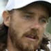 Tommy Fleetwood of England putts on the 13th green during the second round of the British Open Golf Championship in Carnoustie, Scotland, Friday July 
