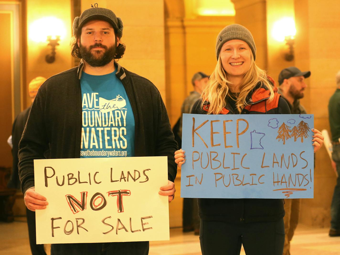 Patagonia employees Pat Winninger, 33, left, and Ingrid Aune, 26, attended the Rally for Public Lands on Thursday at the Capitol.