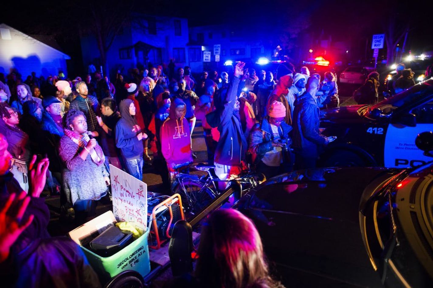 Protestors chanted outside the 4th Precinct parking lot.