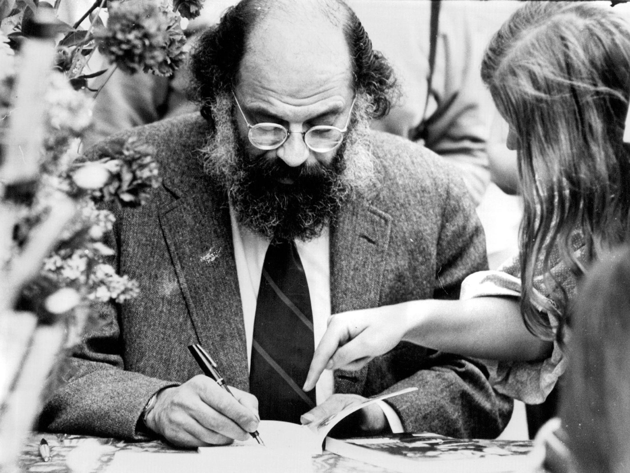May 2, 1977 Poet Allen Ginsberg, in Minneapolis to give a lecture at the University of Minnesota, autographed his book of poetry outside Saturday at University Av. and 4th St. in Dinkytown. A local pantomimist, Rick Shope performed in whiteface for him. "Very delicate," Ginsberg said. He lectured Saturday night in Duluth. Regene Radniecki, Minneapolis Star Tribune