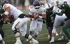 Minnesota State Mankato running back Nate Gunn charged into the line Saturday, when he scored three touchdowns in the Mavericks' victory over Slippery