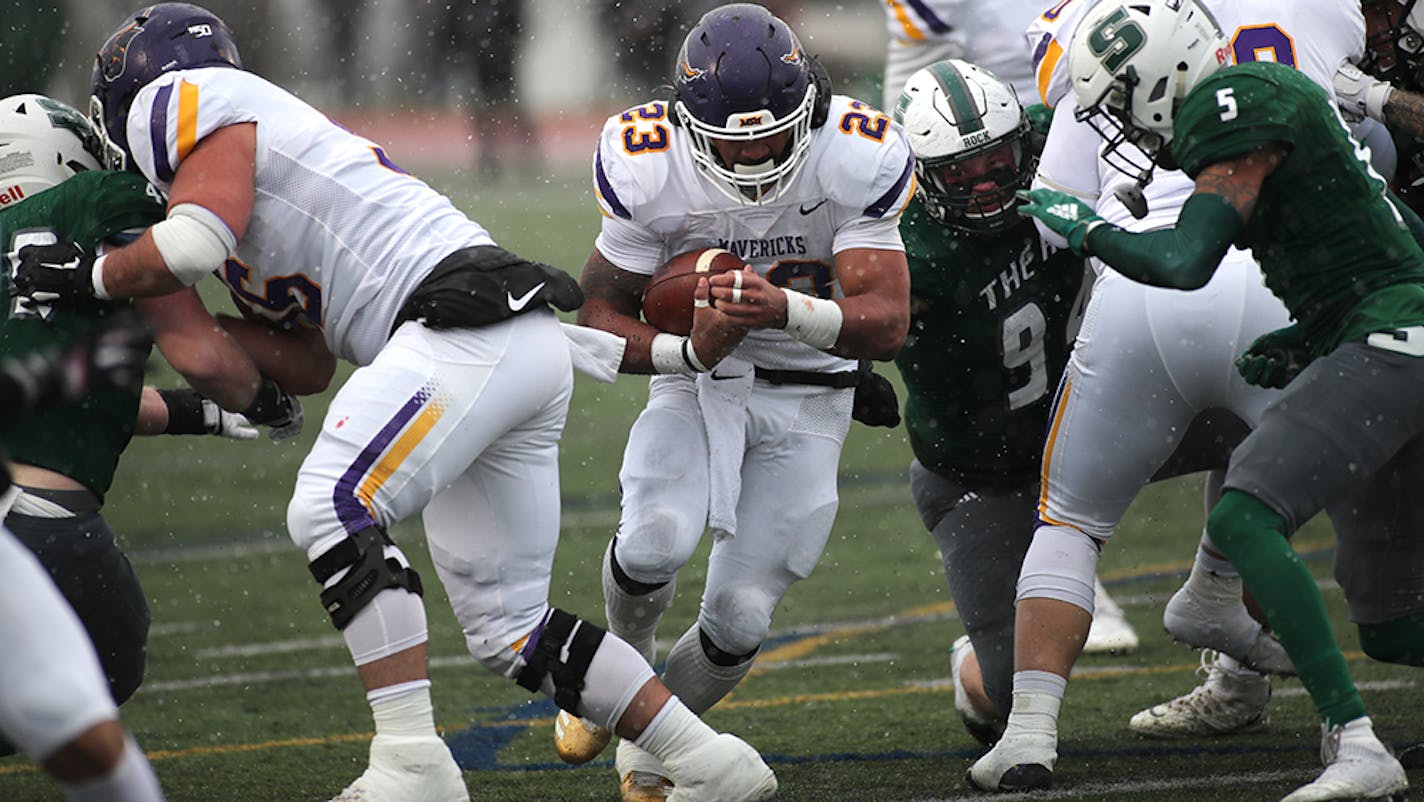 Minnesota State Mankato running back Nate Gunn charged into the line Saturday, when he scored three touchdowns in the Mavericks' victory over Slippery Rock in the NCAA Division II semifinals.