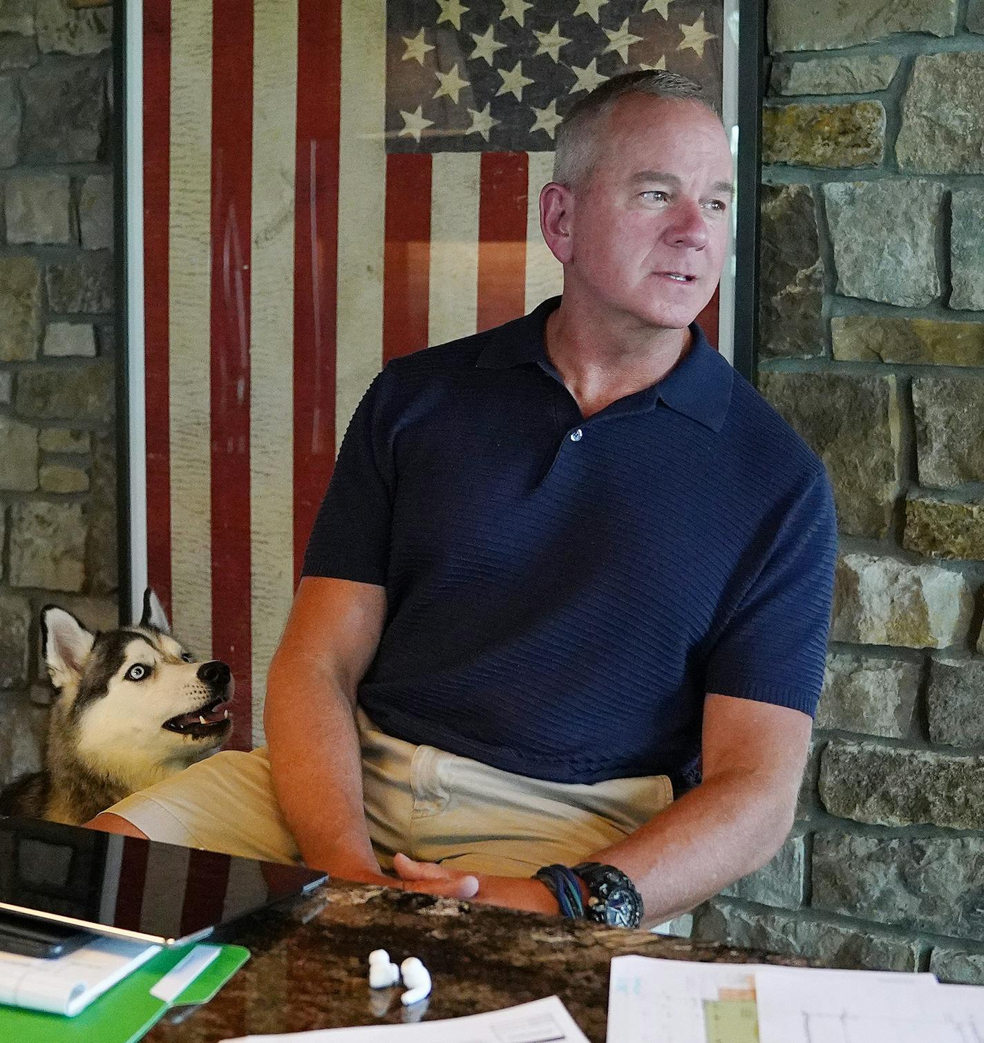 Todd Russell, a commercial real estate consultant from St. Paul, worked from his newly purchased lakefront home in East Gull Lake as his 1-year-old Siberian Husky Isabelle competed for his time Thursday afternoon. ] ANTHONY SOUFFLE • anthony.souffle@startribune.com Todd Russell, a commercial real estate consultant from St. Paul, worked from his newly purchased lakefront home in East Gull Lake where he's been working from home since the COVID-19 pandemic shuttered most in-person business Thursday