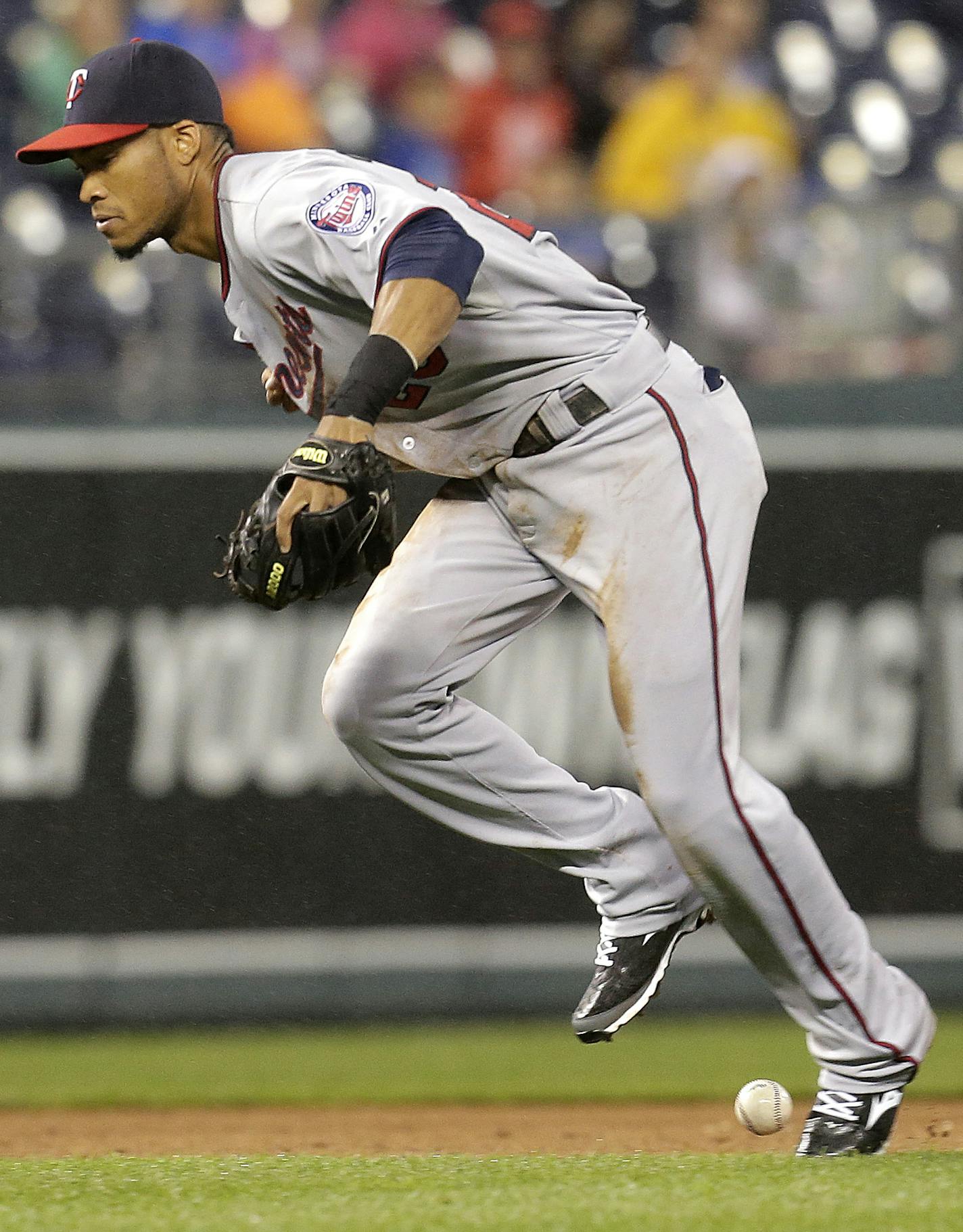 Minnesota Twins shortstop Pedro Florimon misses a ground ball single hit by Kansas City Royals' Billy Butler during the fifth inning of a baseball game Wednesday, June 5, 2013, in Kansas City, Mo. (AP Photo/Charlie Riedel)