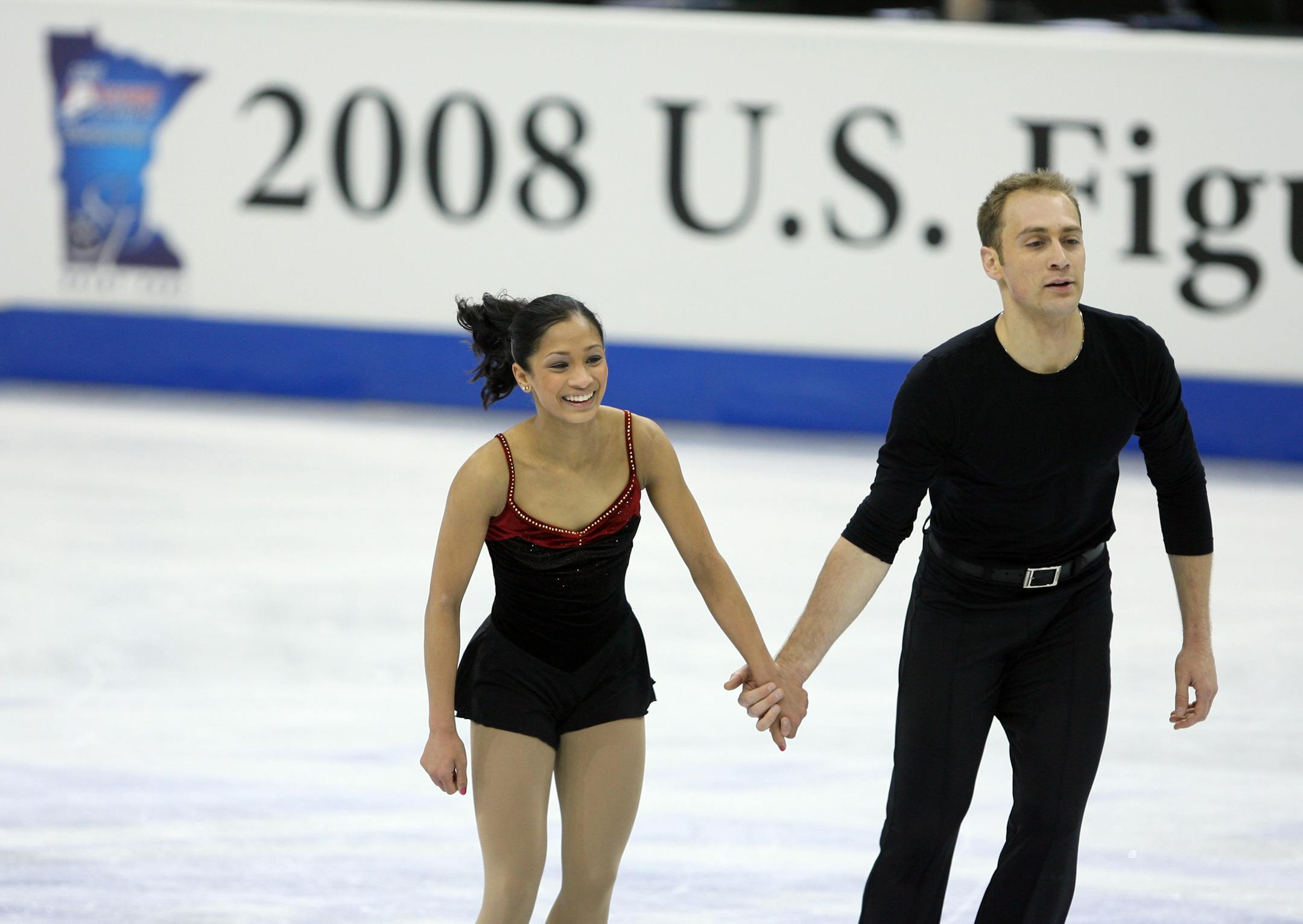 Mark Ladwig and Amanda Evora skated off the ice after the Tuesday morning practce for senior pairs at Xcel Energy Center in St. Paul.
