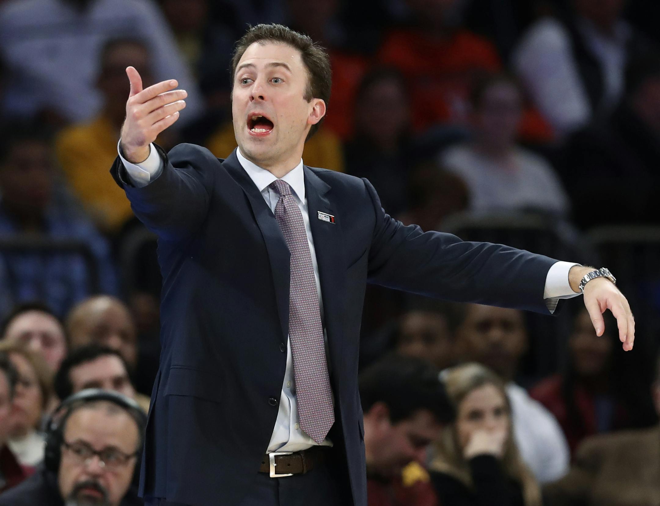 Minnesota coach Richard Pitino gestures during the first half of the team's NCAA college basketball game against Rutgers in the first round of the Big Ten men's tournament, Wednesday, Feb. 28, 2018, in New York. (AP Photo/Kathy Willens)