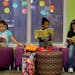 Second-graders Aryana Cole, left, Tenagnework Agedie, center, and Jennifer Balboa, found a spot to read at North Park Elementary School in Fridley, MN