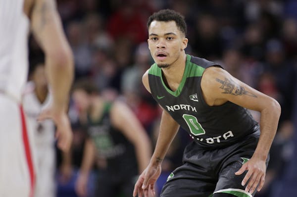 North Dakota guard Geno Crandall (0) prepares to defend during the second half of an NCAA college basketball game against Gonzaga in Spokane, Wash., S
