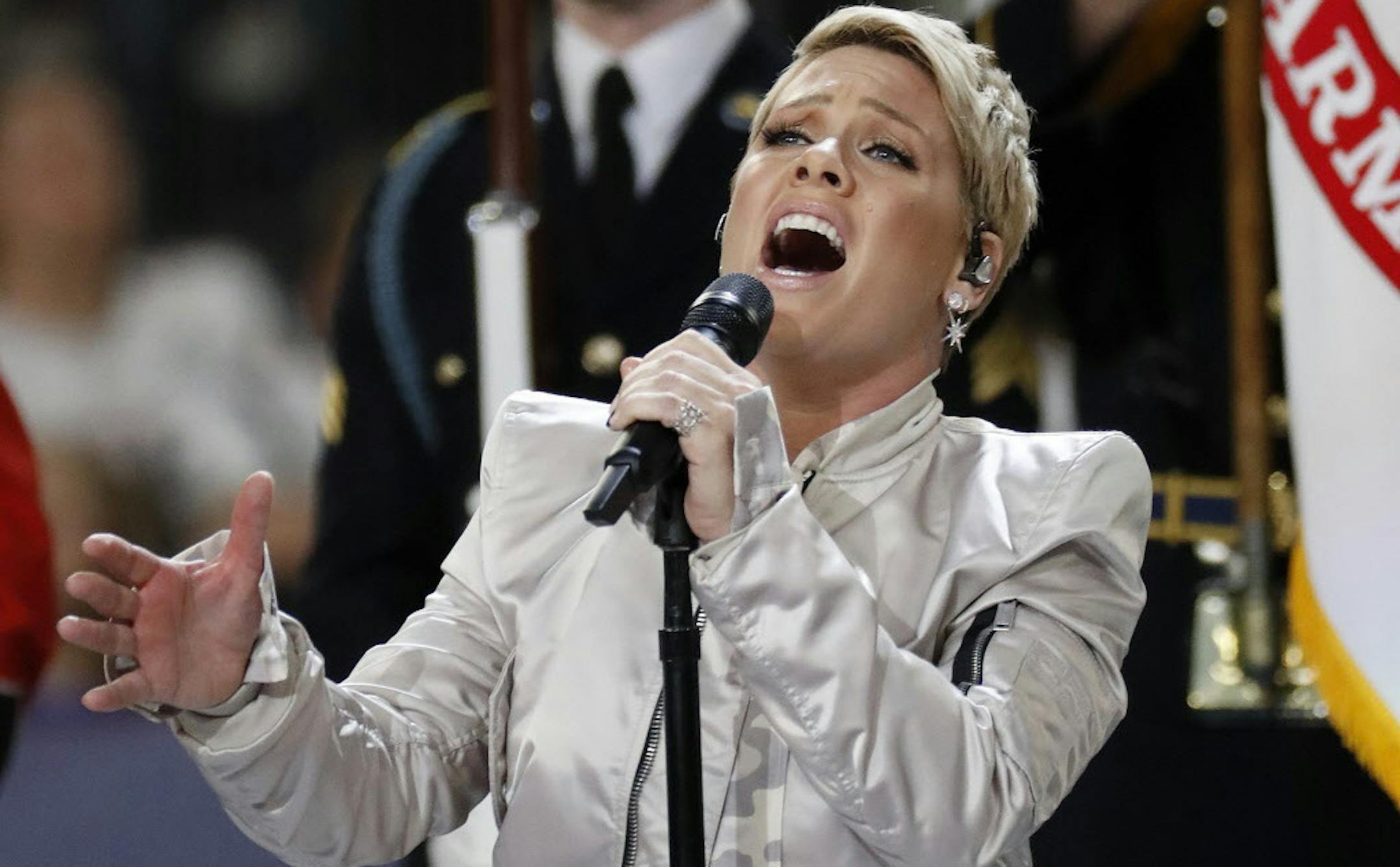 Pink performs the national anthem before the NFL Super Bowl 52 football game between the Philadelphia Eagles and the New England Patriots Sunday, Feb. 4, 2018, in Minneapolis. (AP Photo/Matt York)