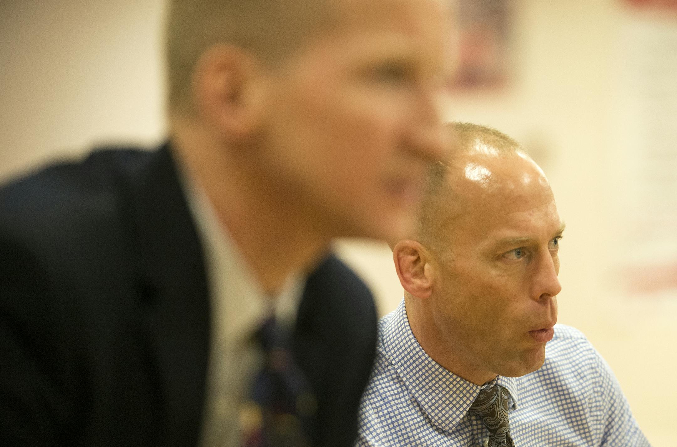 Centennial High School wrestling coach, John Bergeland, right, whistles to one of his wrestlers during a match against Stillwater on Friday night. ] (Aaron Lavinsky | StarTribune) Feature on Centennial wrestling coach John Bergeland and his accomplished wrestling sons Jack and Jake. Photographed on Friday, Jan. 9, 2015 at Centennial High School.