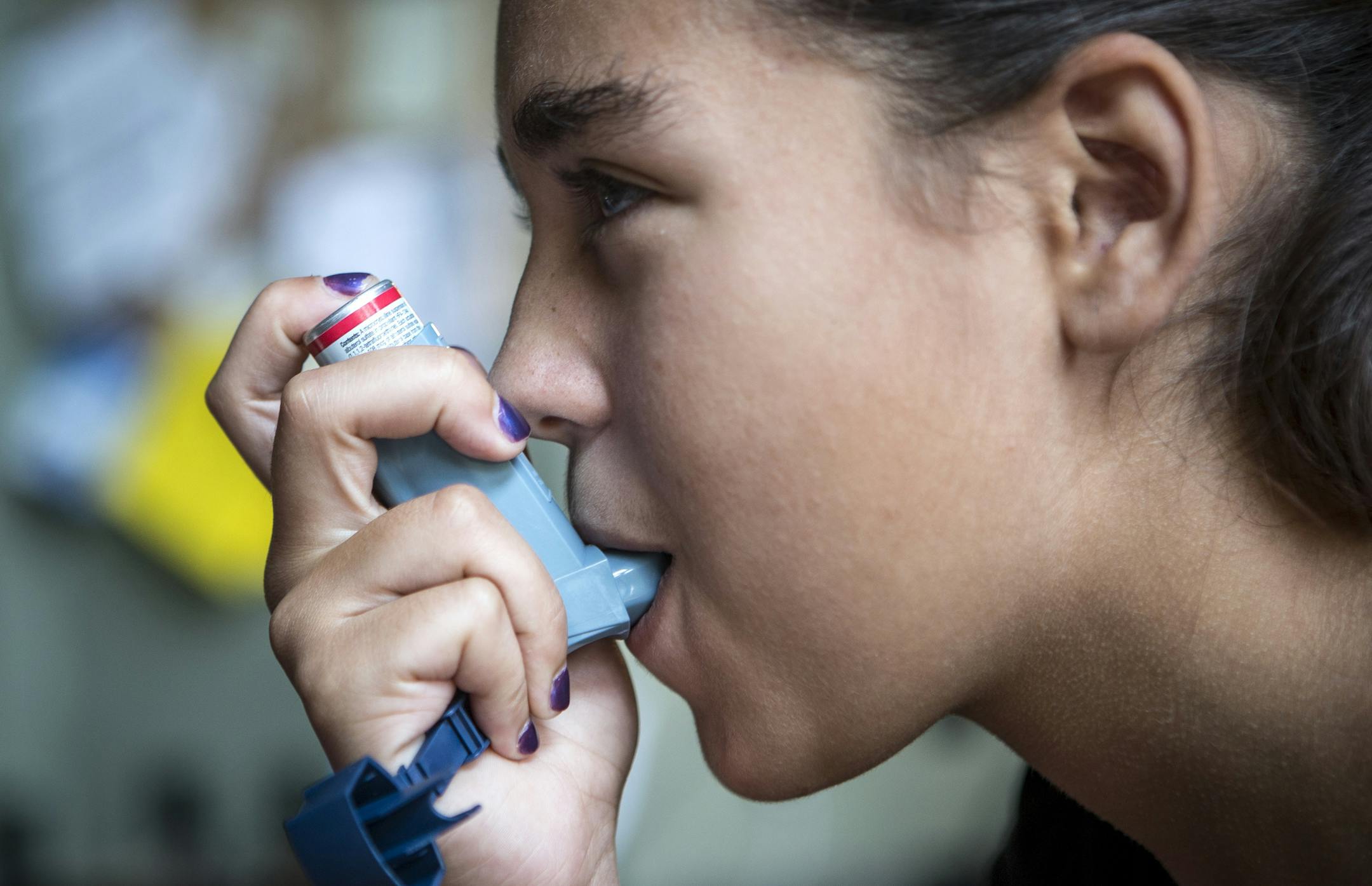 Hannah Hayes, 13, with an asthma inhaler at her family's vacation home in Truckee, Calif., Sept. 1, 2013. The high price of commonly used medications for conditions like asthma contributes heavily to health care costs and certainly causes more widespread anguish. (Max Whittaker/The New York Times)