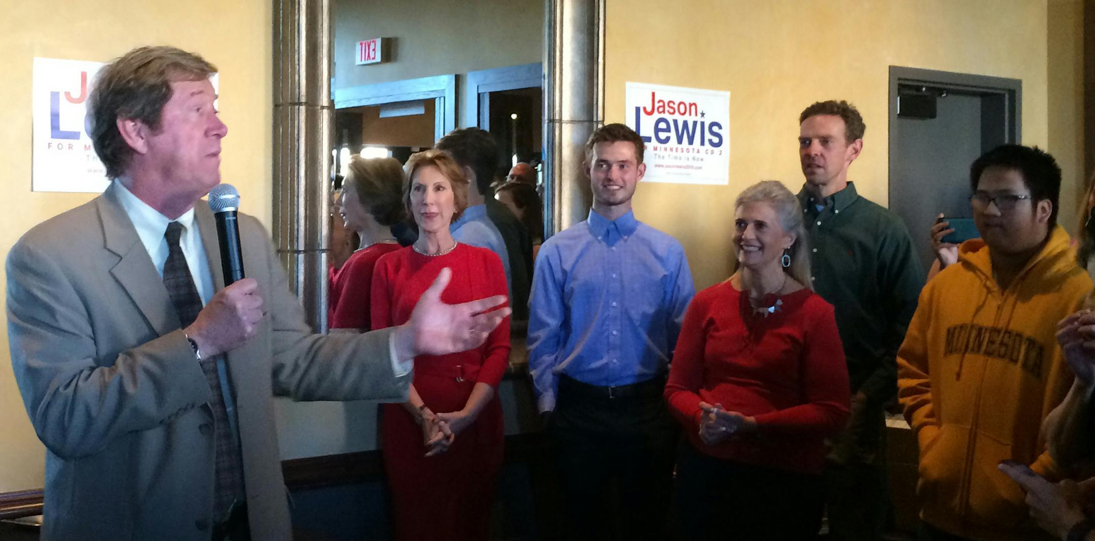 Jason Lewis spoke to supporters at a campaign event Wednesday that was headlined by former GOP presidential candidate Carly Fiorina, in red, the onetime CEO of Hewlett Packard. Lewis is running for Congress in Minnesota's 2nd District.