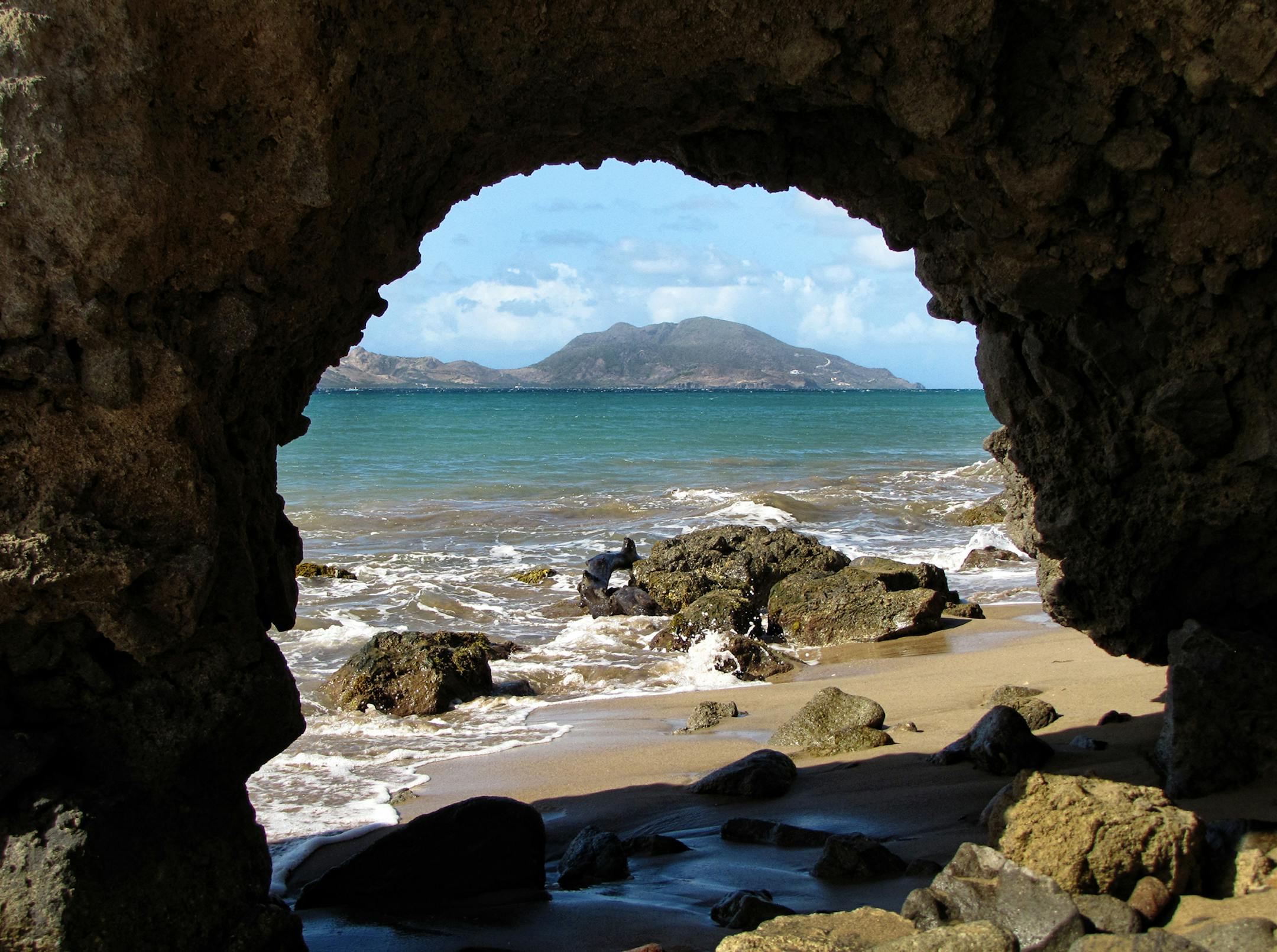 A view of St. Kitts from a quiet beach on the leeward side of Nevis; Nevis is six miles wide by eight miles long, the smaller of the sister islands that make up the Federation of St. Kitts and Nevis, former British colonies. Illustrates TRAVEL-NEVIS (category t), by Necee Regis, special to The Washington Post. Moved Tuesday, October 22, 2013. (MUST CREDIT: Photo by Necee Regis for The Washington Post.)