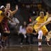 Gophers guard Gadiva Hubbard (34) swatted the ball away from Seminoles guard Brittany Brown (12) in the fourth quarter.