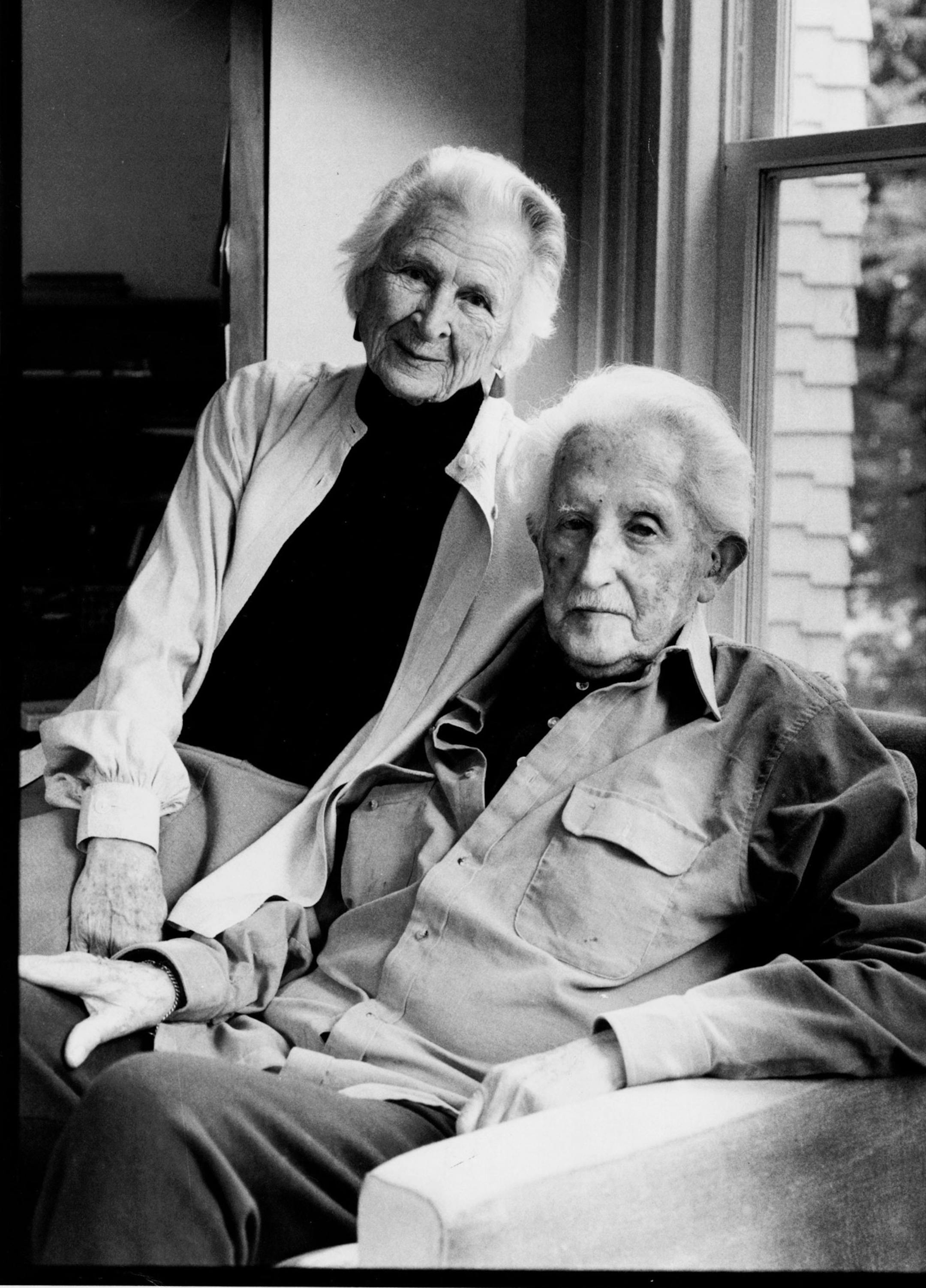 FILE -- Erik Erikson and his wife Joan at their home in 1988. Erikson, a social psychologist, found himself revising his influential theories about the eight distinct stages of human development to add an additional final stage in which the elderly use wisdom to ward off despair brought on by old age. (The New York Times)