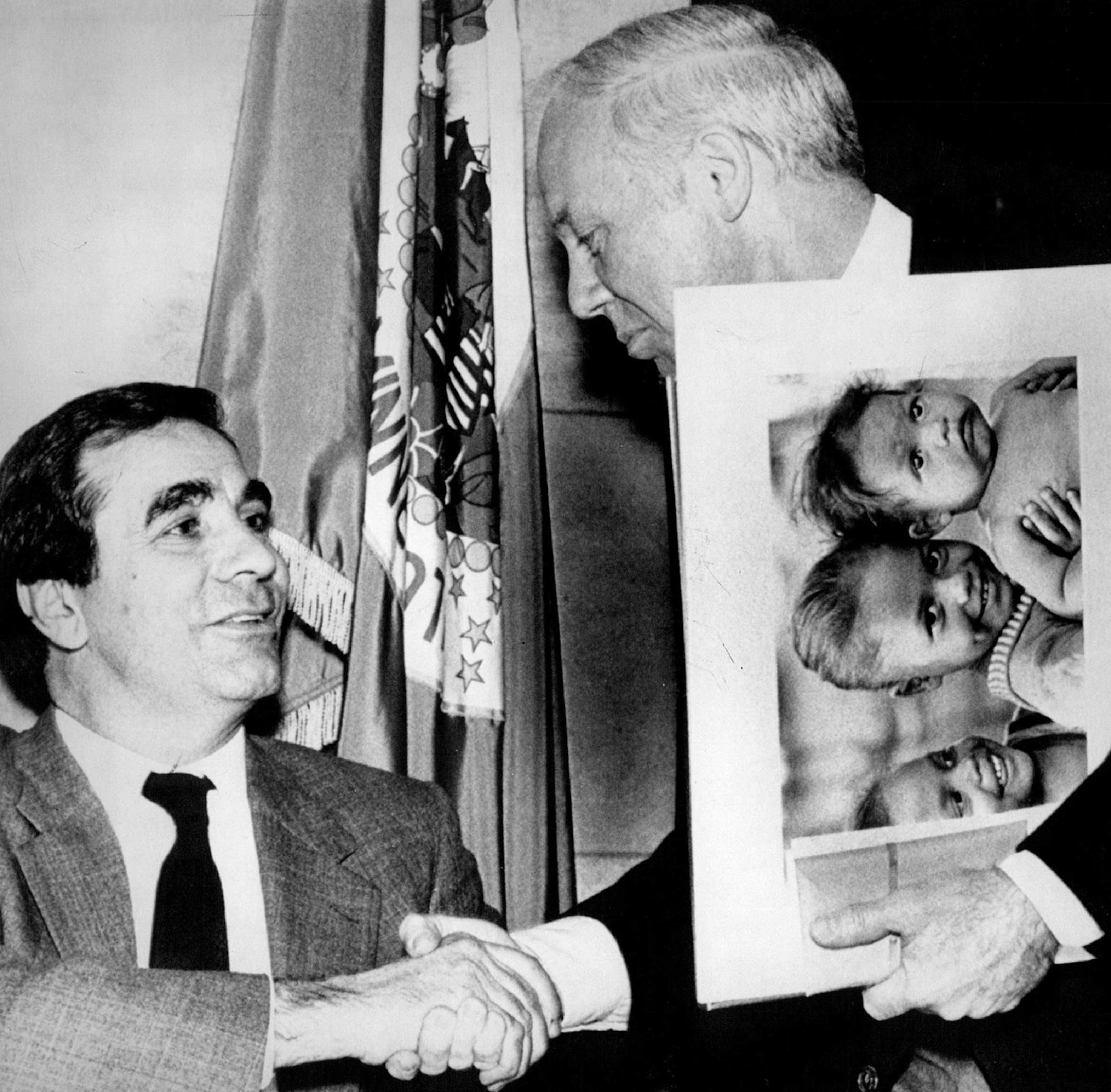 April 3, 1986 Xgr Fulbright Awards - U.S. Congressmen Bruce Vento and James Oberstar shake hands after receiving Fulbright awards for their votes against aid to "contras" seeking to overthrow the Nicaraguan government. Seven c,Aagressmen were recognized at the Honorary Aiinnesota J. William Fulbright Award Ceremony held in the state Capitol Rotunda Wednesday. Joey McLeister, AP Laserphoto