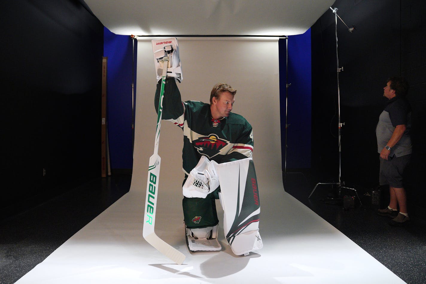 Minnesota Wild goaltender Devan Dubnyk (40) waited as team photographer Bruce Kluckhohn adjusted his lighting equipment during media day Thursday. ] ANTHONY SOUFFLE &#x2022; anthony.souffle@startribune.com Players and team officials posed for photos and video clips during the Minnesota Wild media day Thursday, Sept. 12, 2019 at their TRIA Rink training facility in St. Paul, Minn.