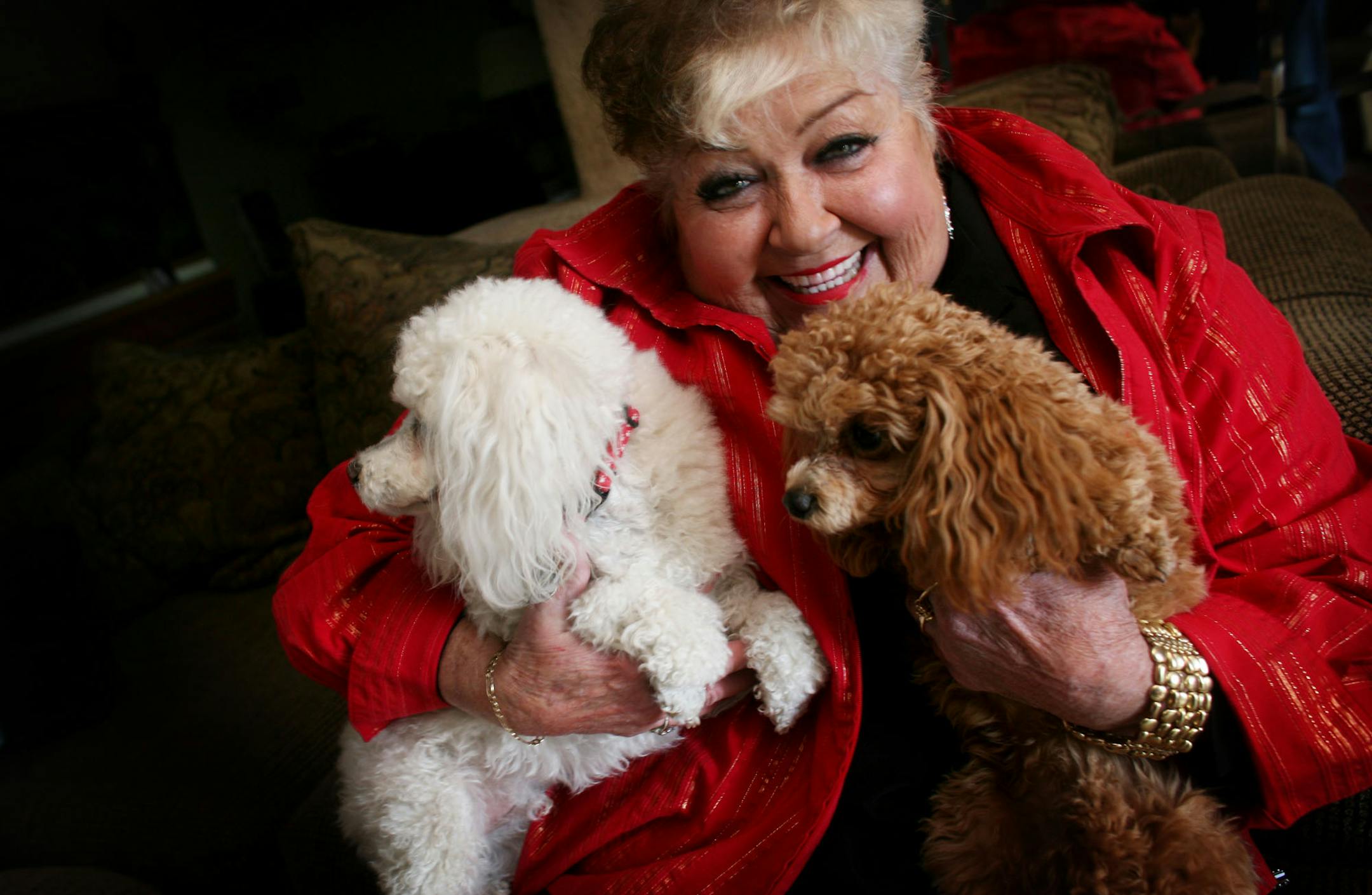 Jane McCormick was a Vegas call-girl in the 60's, serving the Rat Pack including she claims Frank Sinatra. She has written a book about her life with friend Patti Wicklund about her life including her abusive childhood. Tuesday she posed for a picture with her dogs at her home in Vadnais Heights.